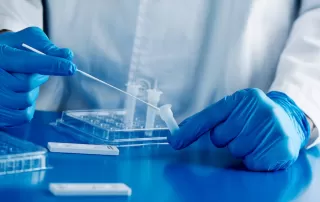 healthcare worker using a covid 19 antigen test